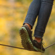 A person walking along a tightrope